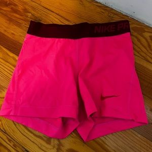 Hot pink Nike Pros
